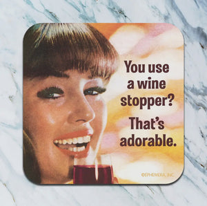 You use a wine stopper? That’s adorable. Coaster